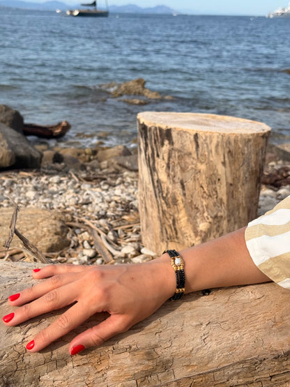 bracelet tresor des mers noir dore